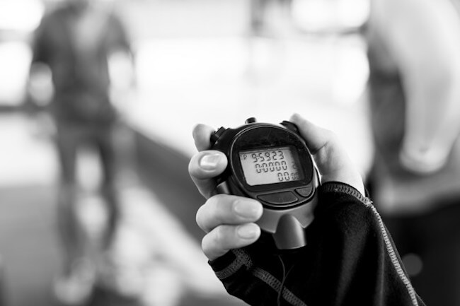 loseup of hand holding stopwatch